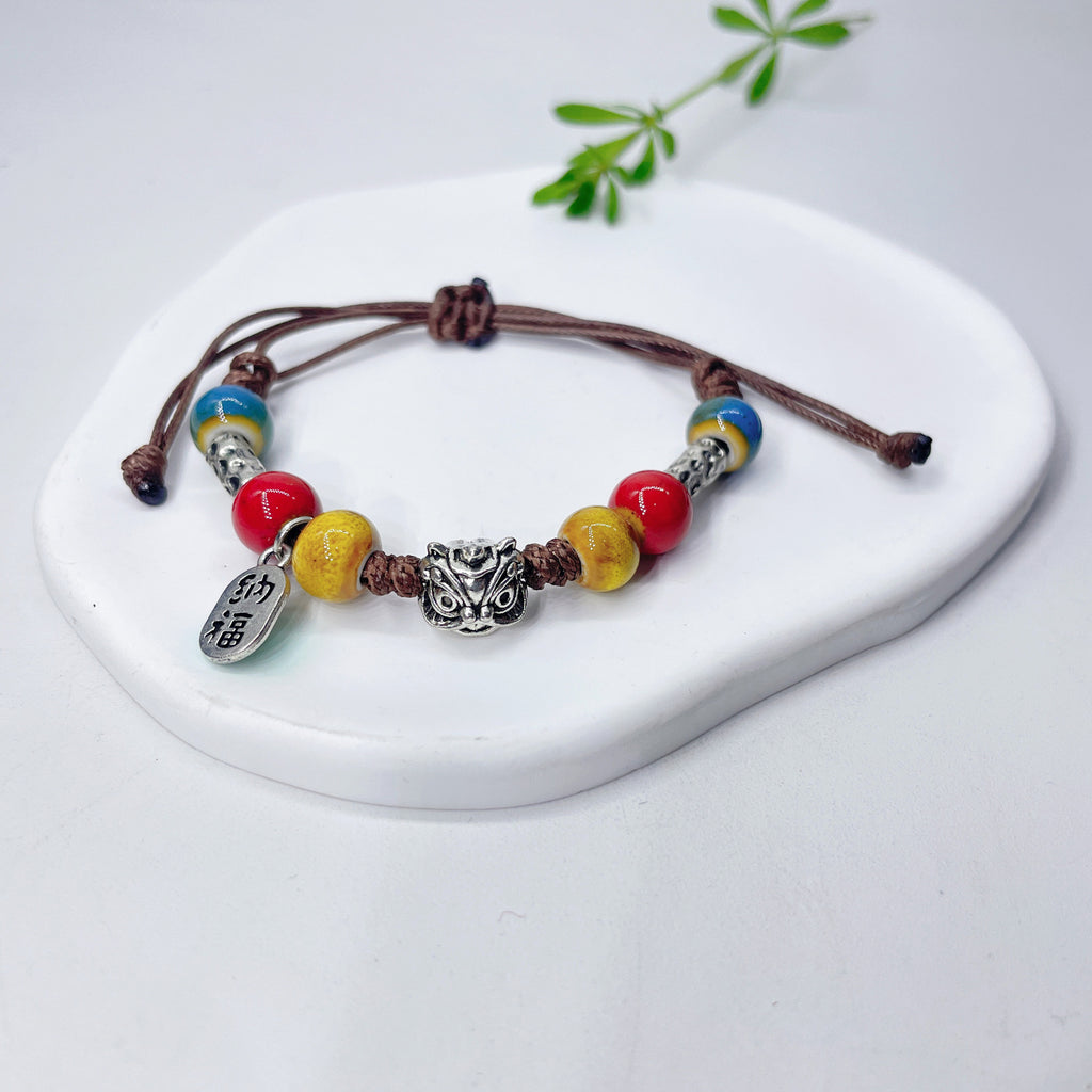 Aura Artisan Ceramic Charm Strand — Hand-Woven Friendship Bracelet