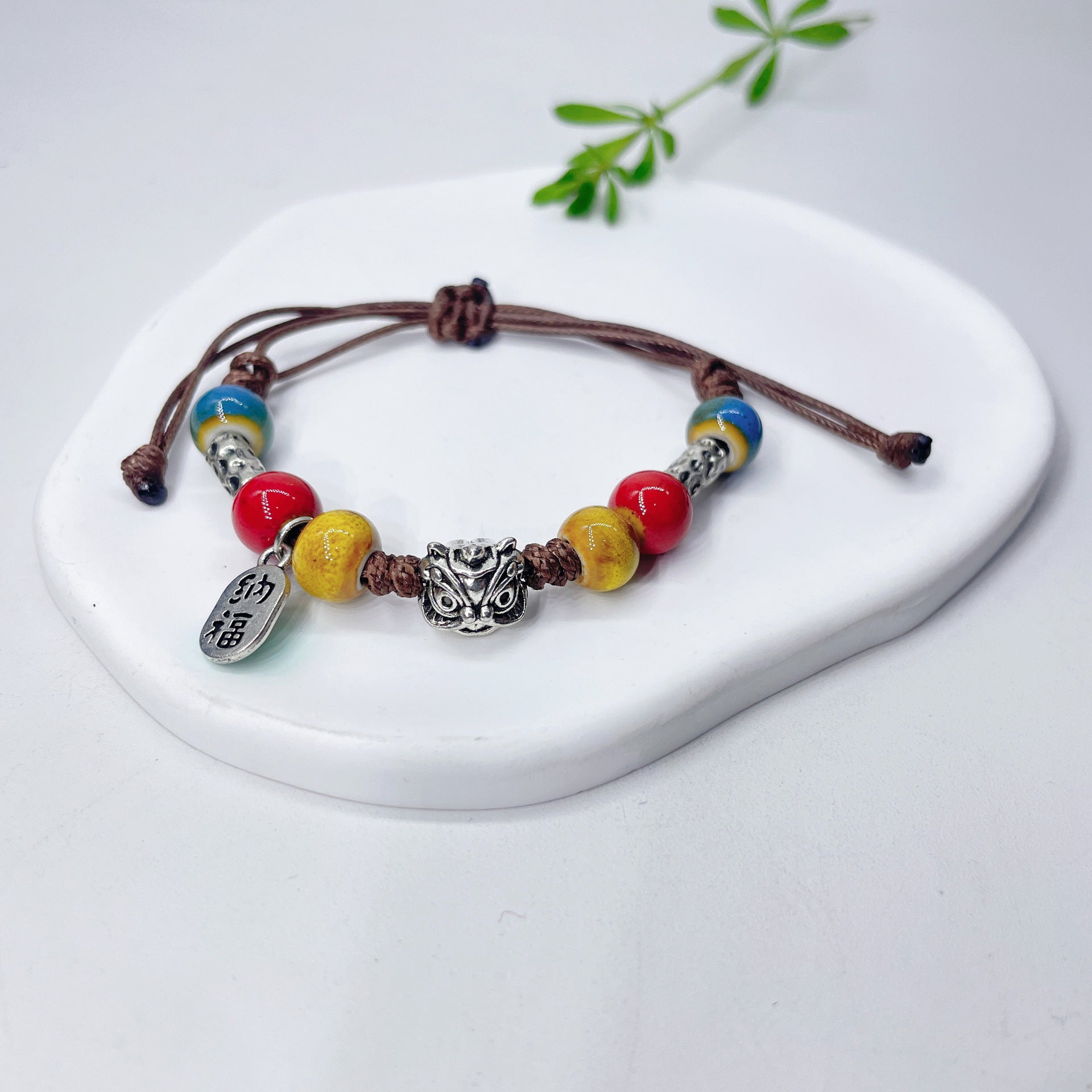 Aura Artisan Ceramic Charm Strand — Hand-Woven Friendship Bracelet
