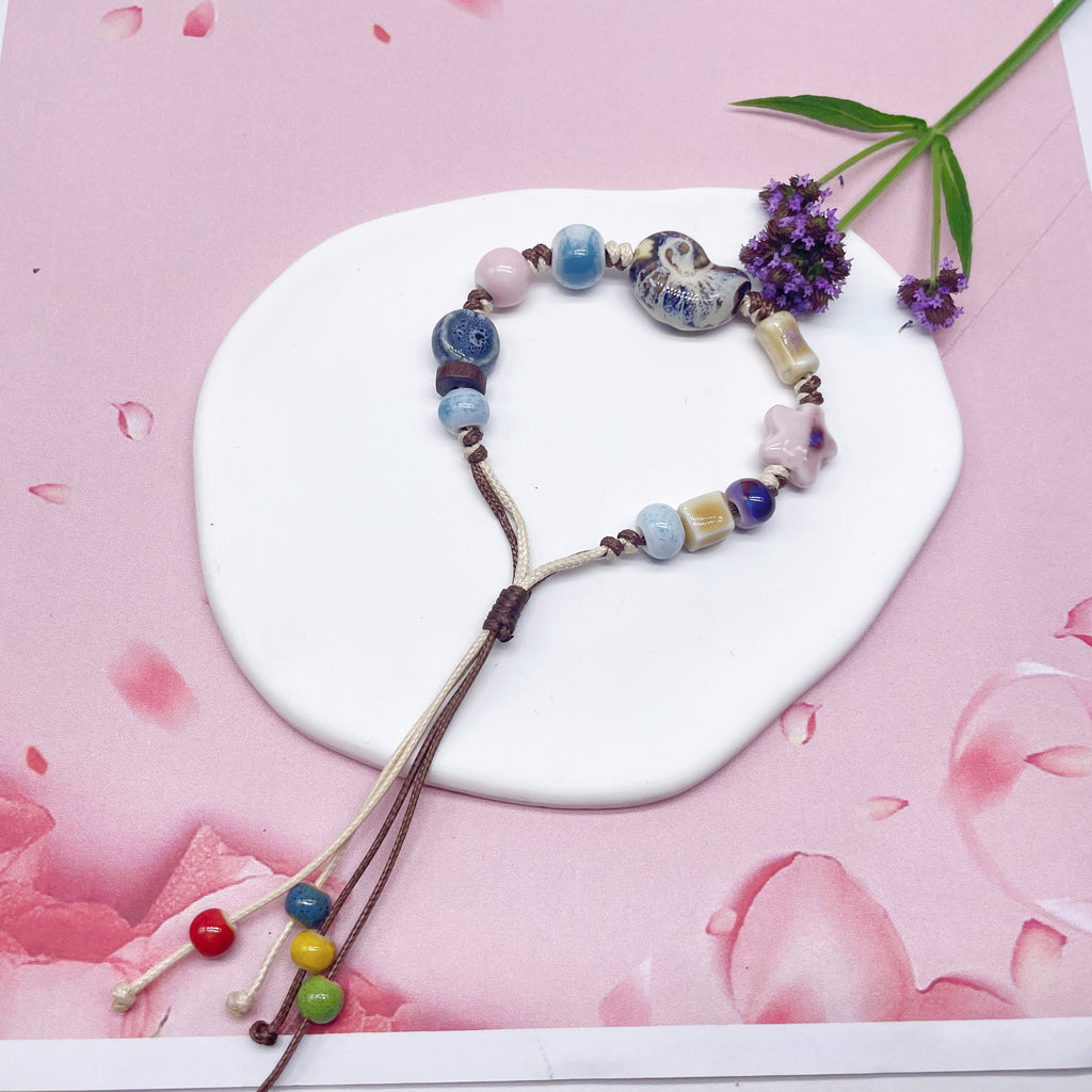 Aura Artisan Ceramic Charm Strand — Hand-Woven Friendship Bracelet