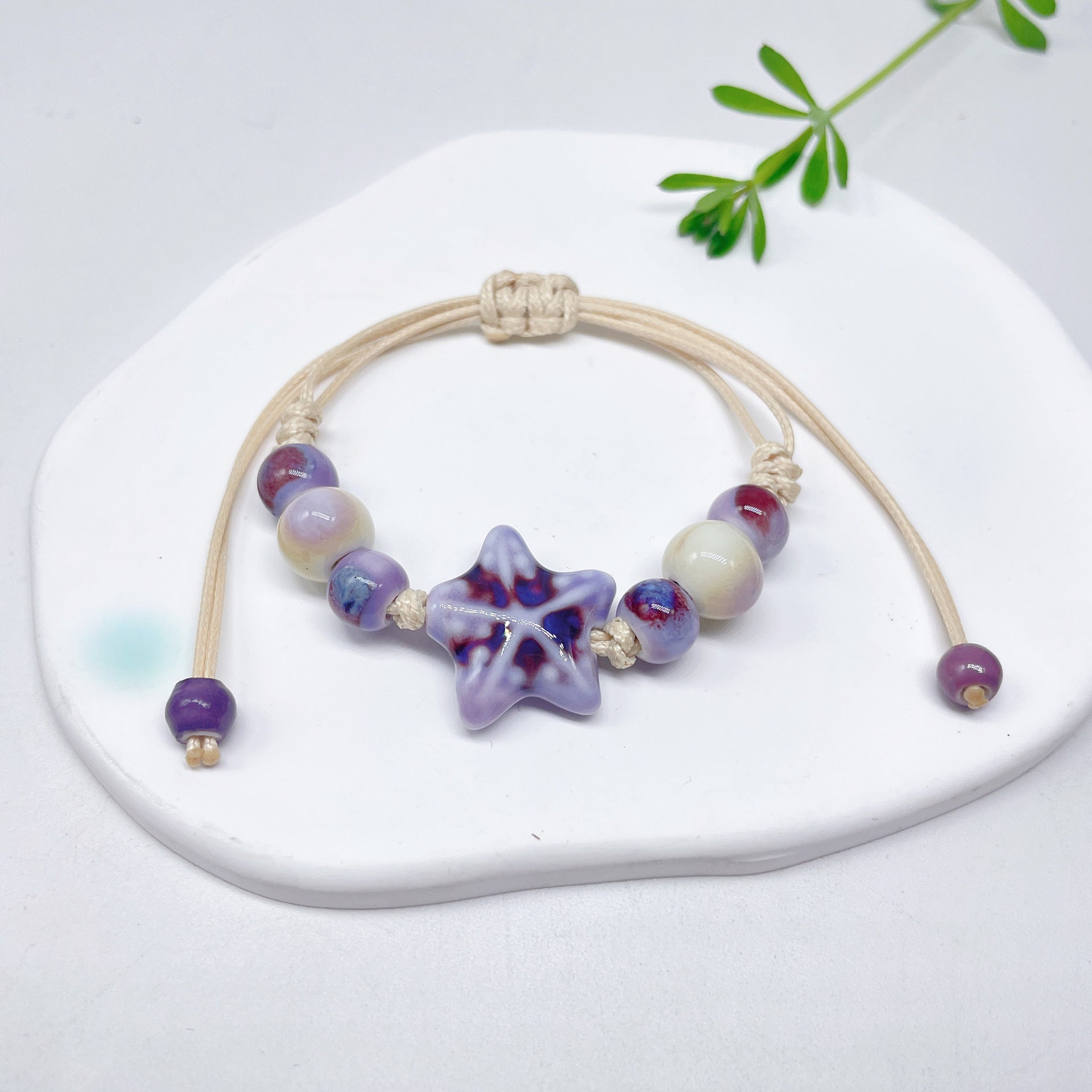 Aura Artisan Ceramic Charm Strand — Hand-Woven Friendship Bracelet