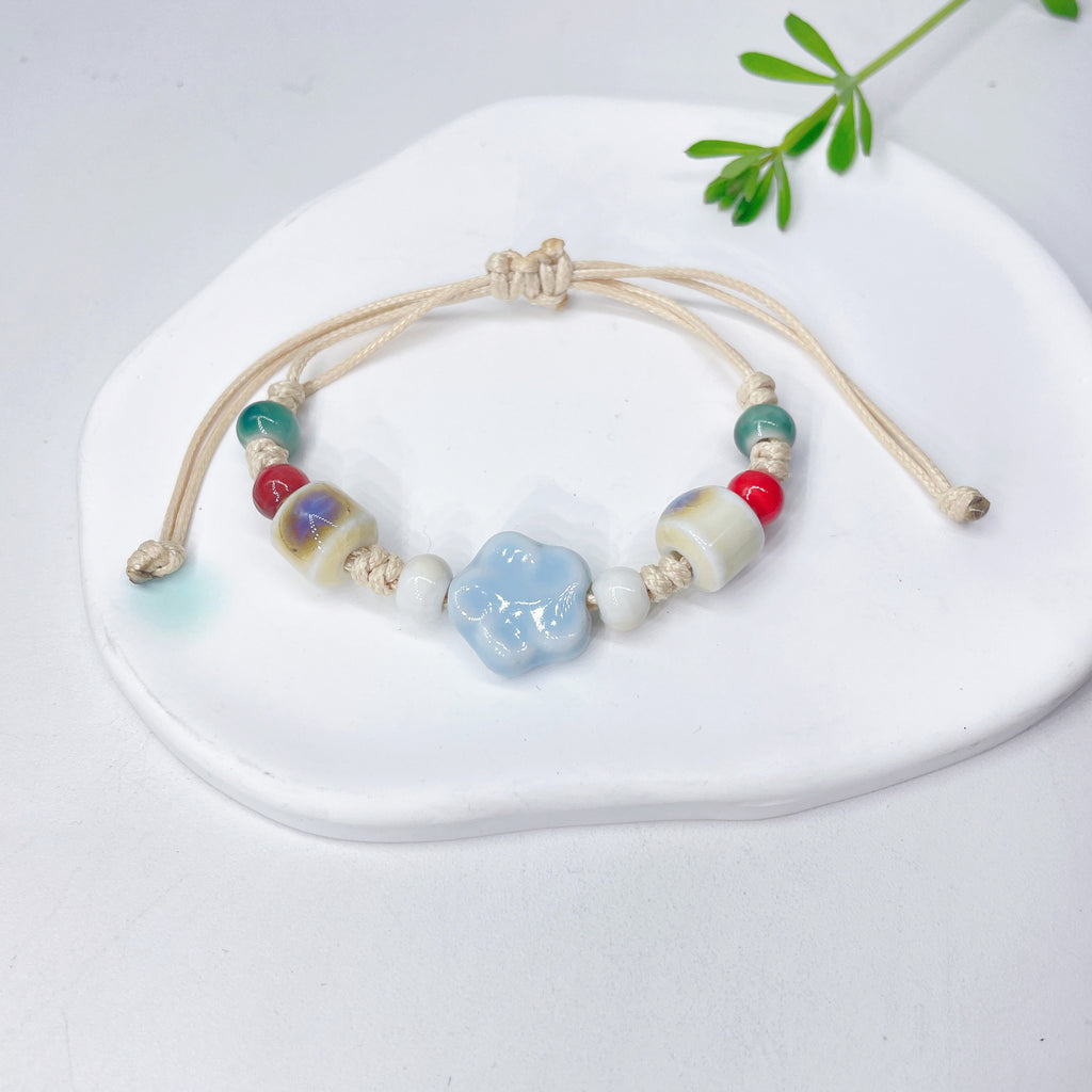 Aura Artisan Ceramic Charm Strand — Hand-Woven Friendship Bracelet