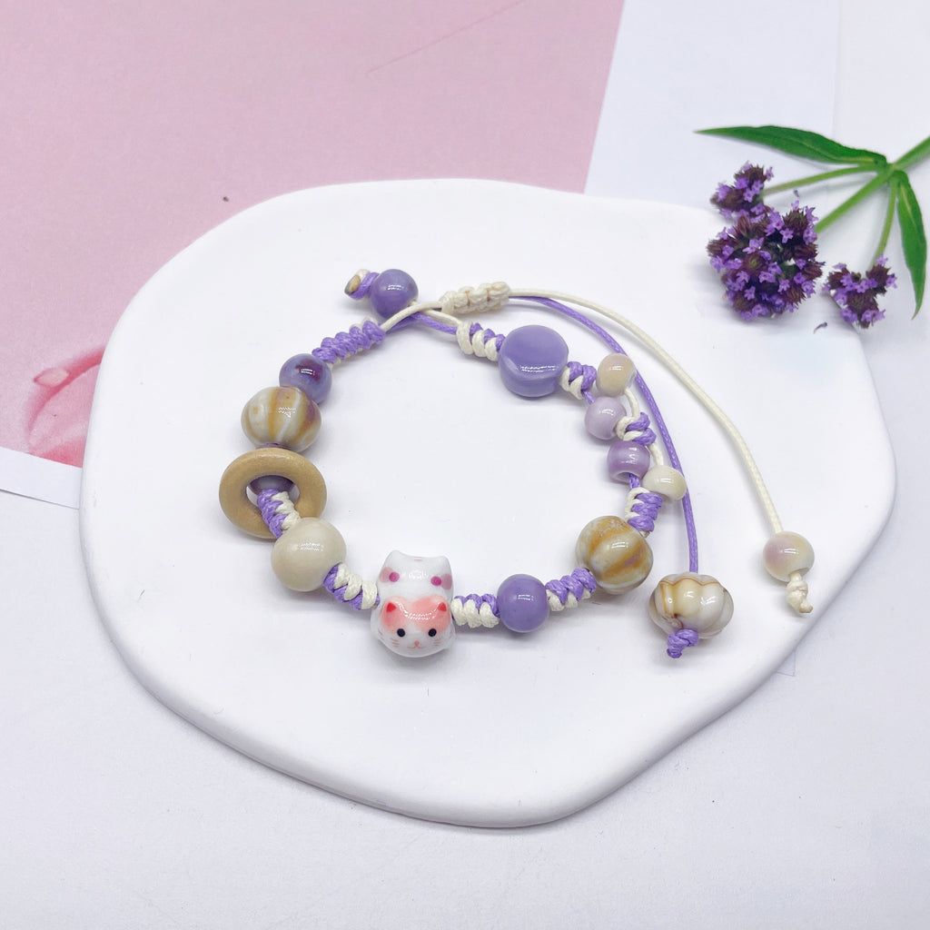 Aura Artisan Ceramic Charm Strand — Hand-Woven Friendship Bracelet