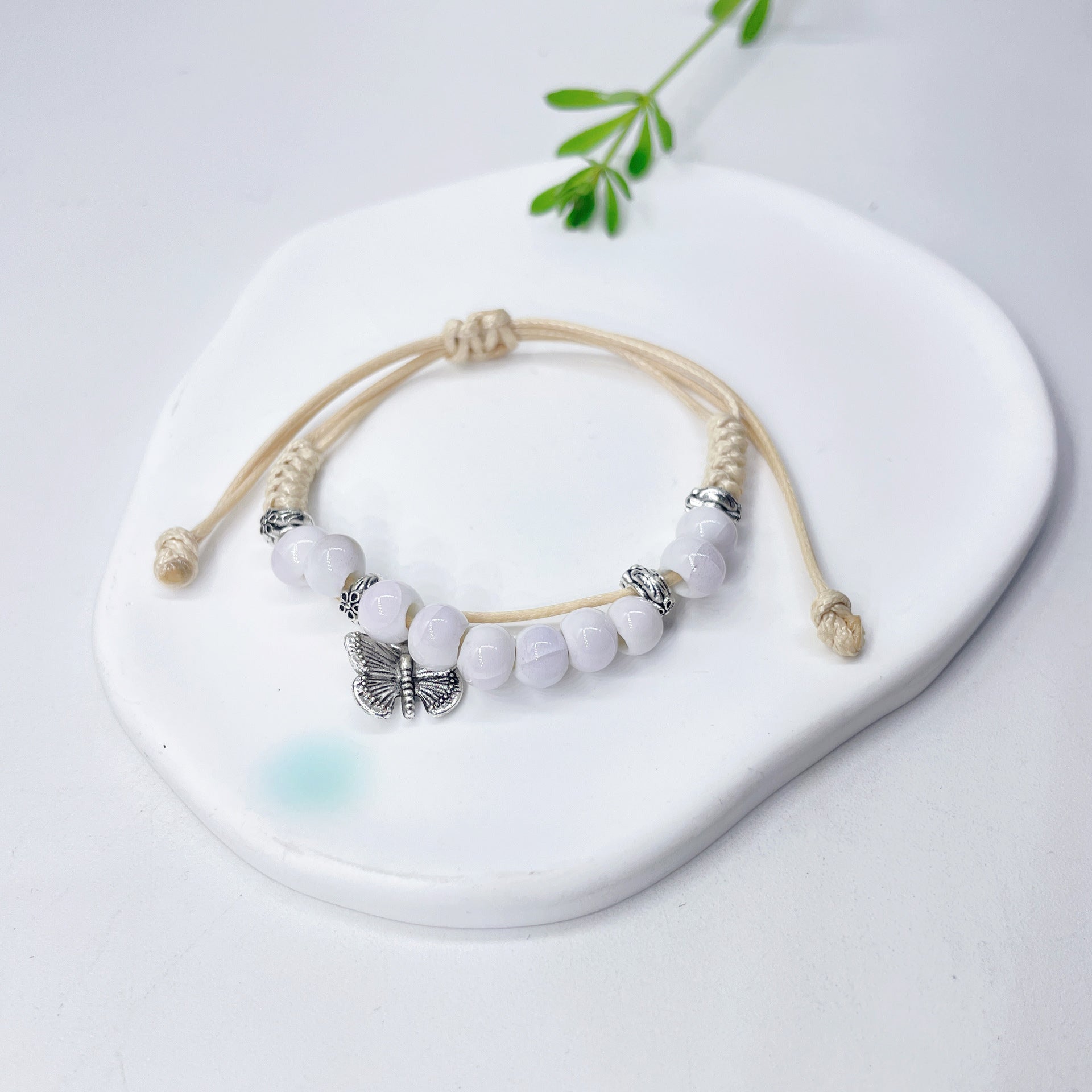 Aura Artisan Ceramic Charm Strand — Hand-Woven Friendship Bracelet