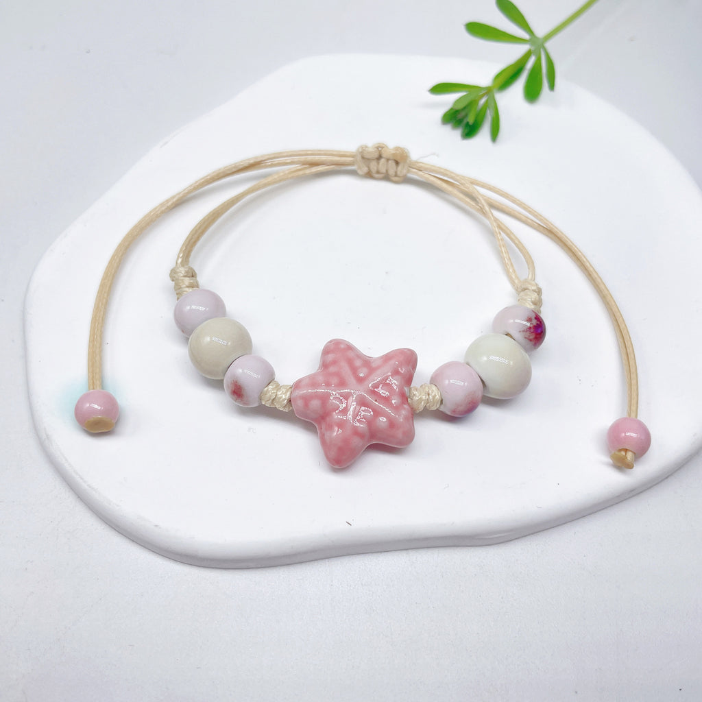 Aura Artisan Ceramic Charm Strand — Hand-Woven Friendship Bracelet