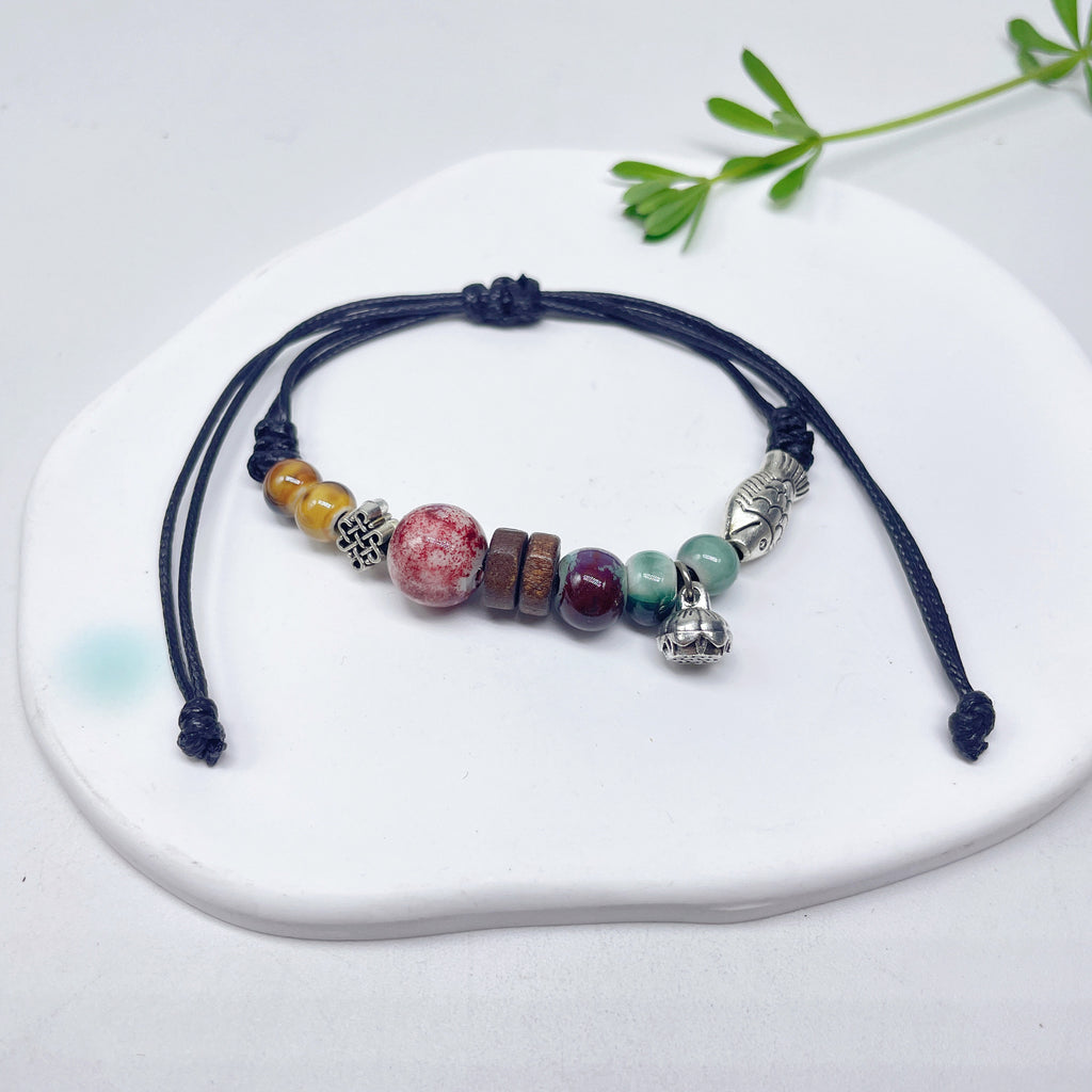 Aura Artisan Ceramic Charm Strand — Hand-Woven Friendship Bracelet