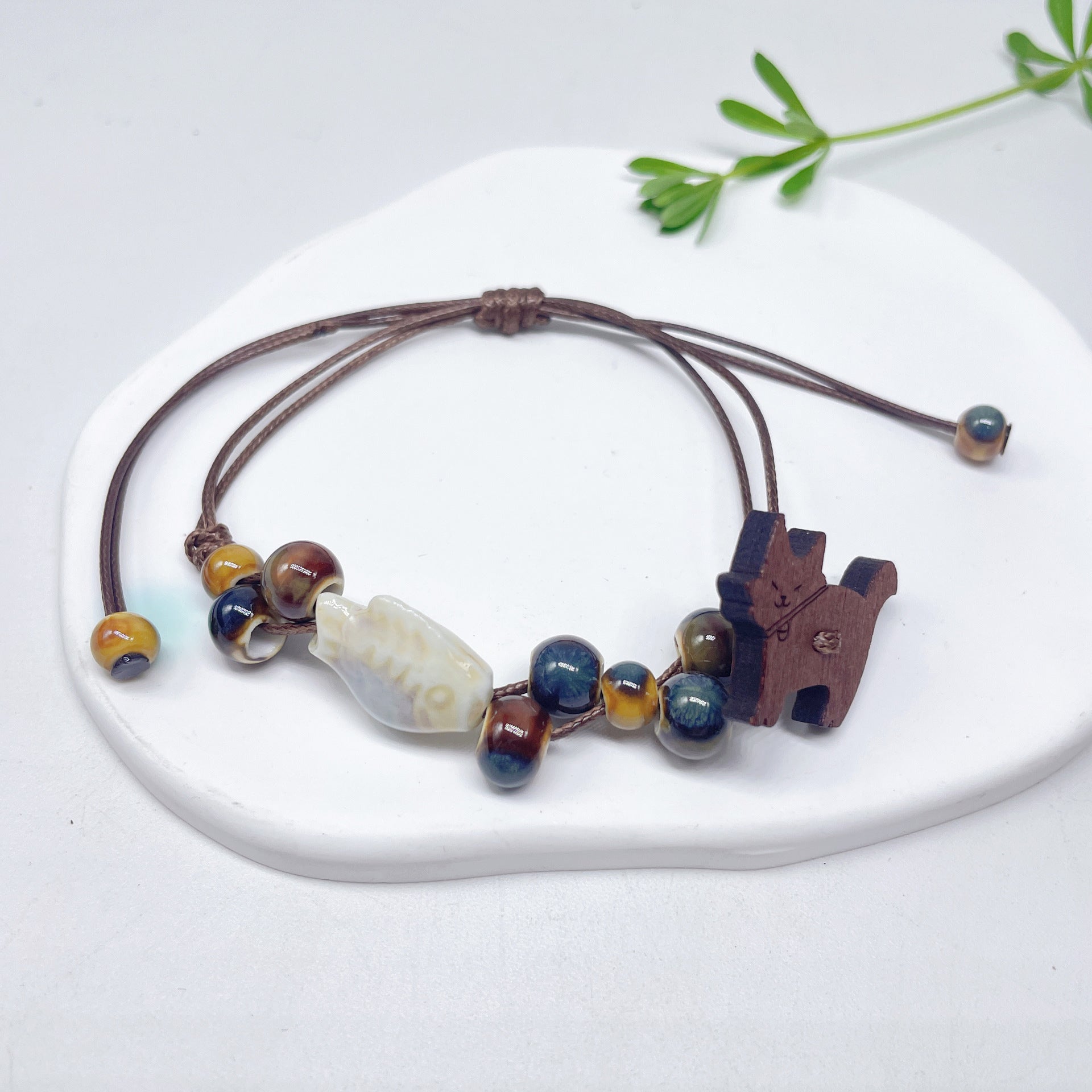 Aura Artisan Ceramic Charm Strand — Hand-Woven Friendship Bracelet