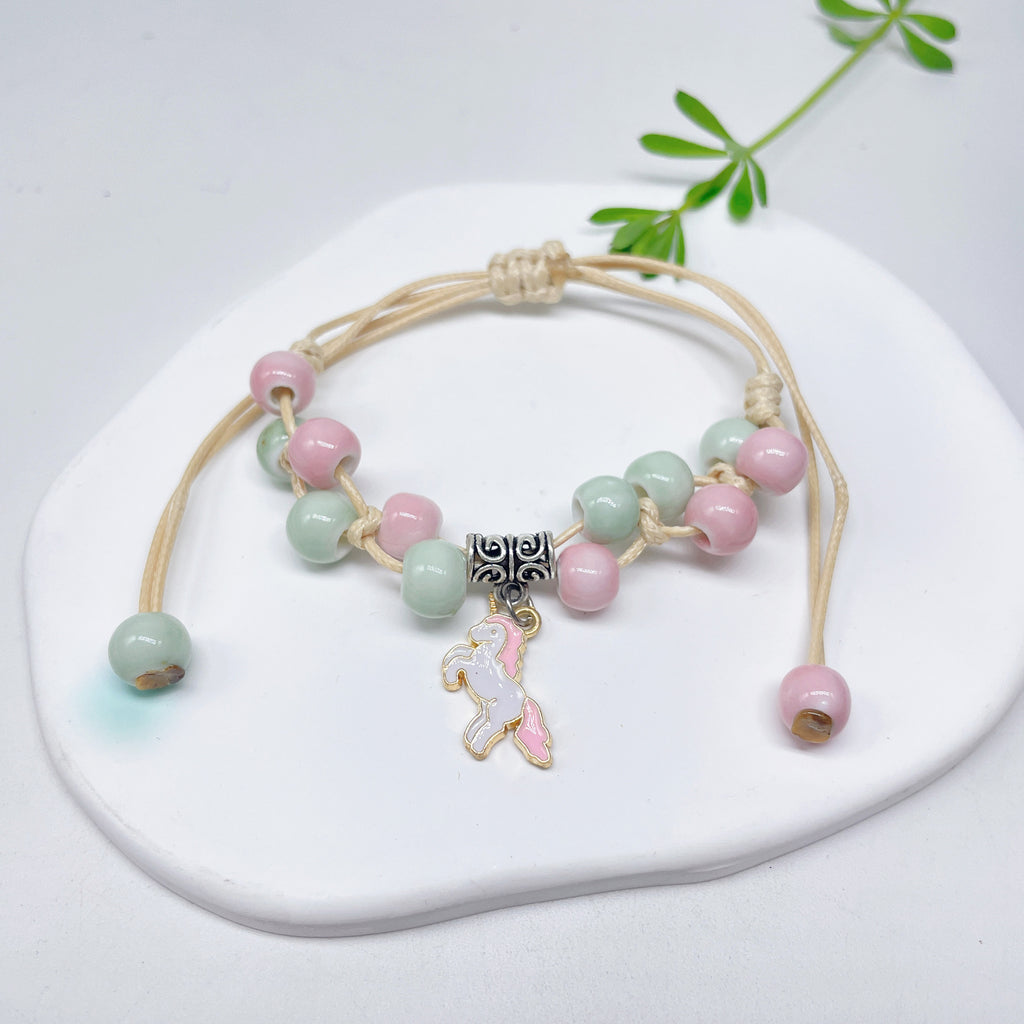 Aura Artisan Ceramic Charm Strand — Hand-Woven Friendship Bracelet