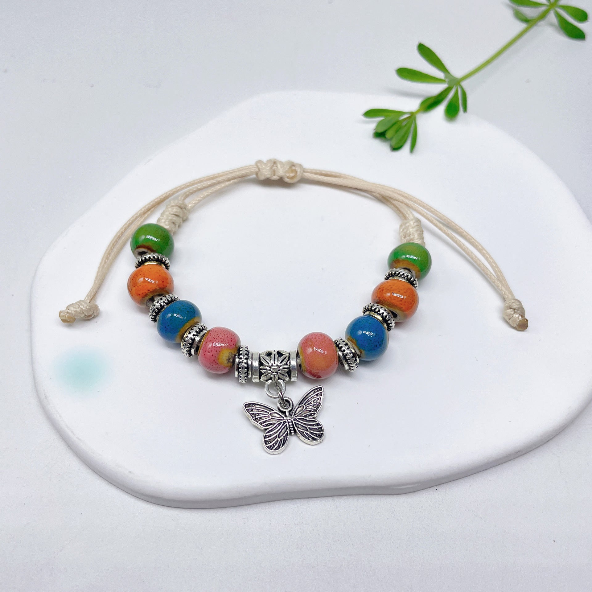 Aura Artisan Ceramic Charm Strand — Hand-Woven Friendship Bracelet