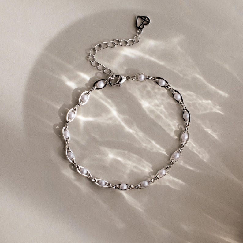 Eternity Pearl Infinity Bracelet — Lustrous Mother of Pearl Aura